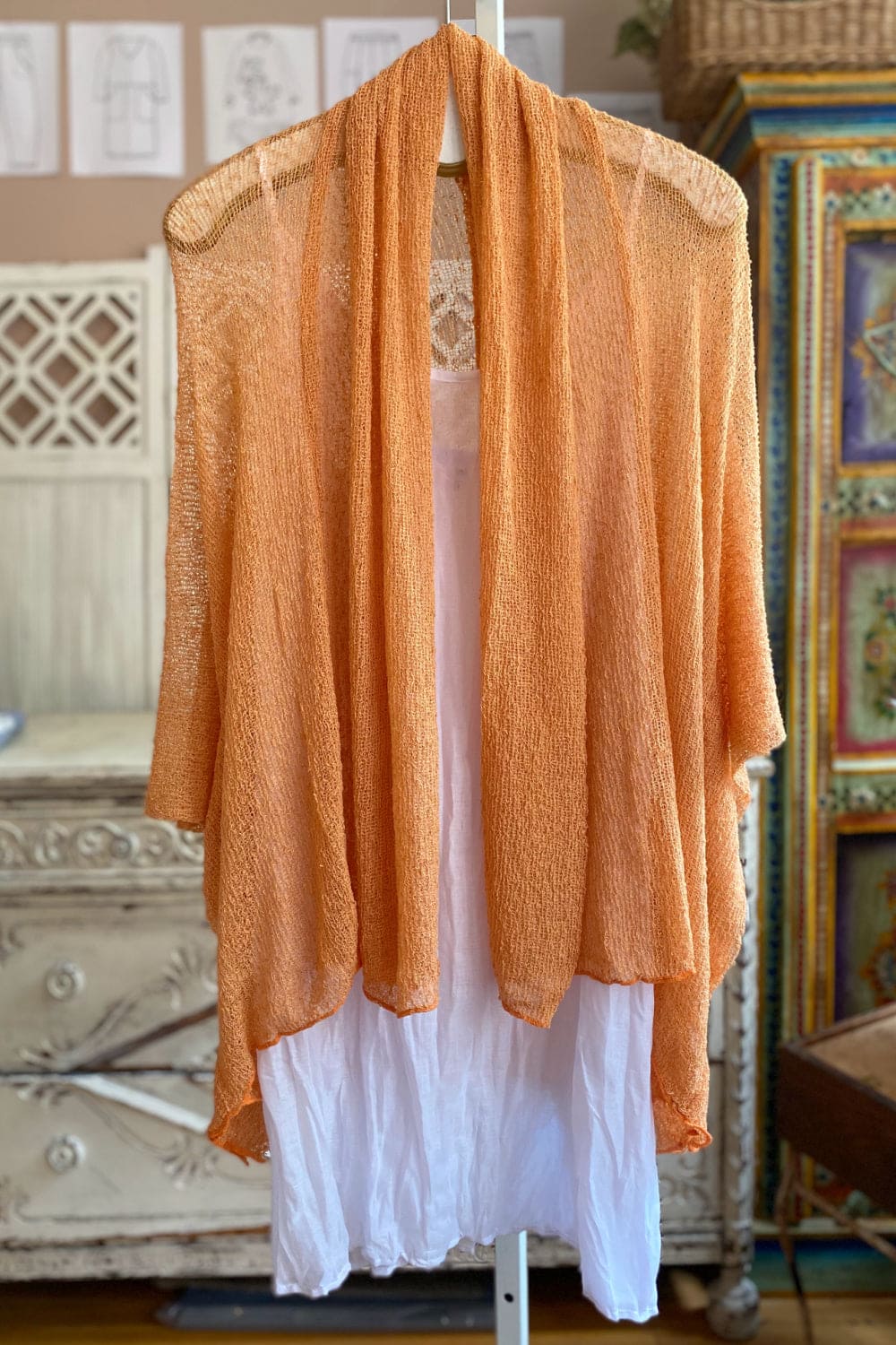 Apricot color sheer oversize women's summer sweater.