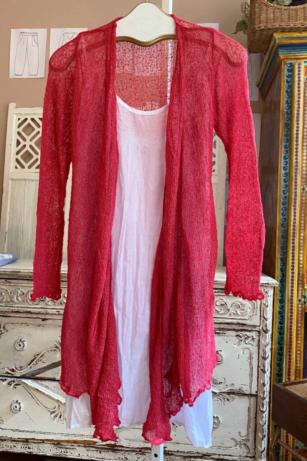 Cherry red long sleeve loose knit duster.