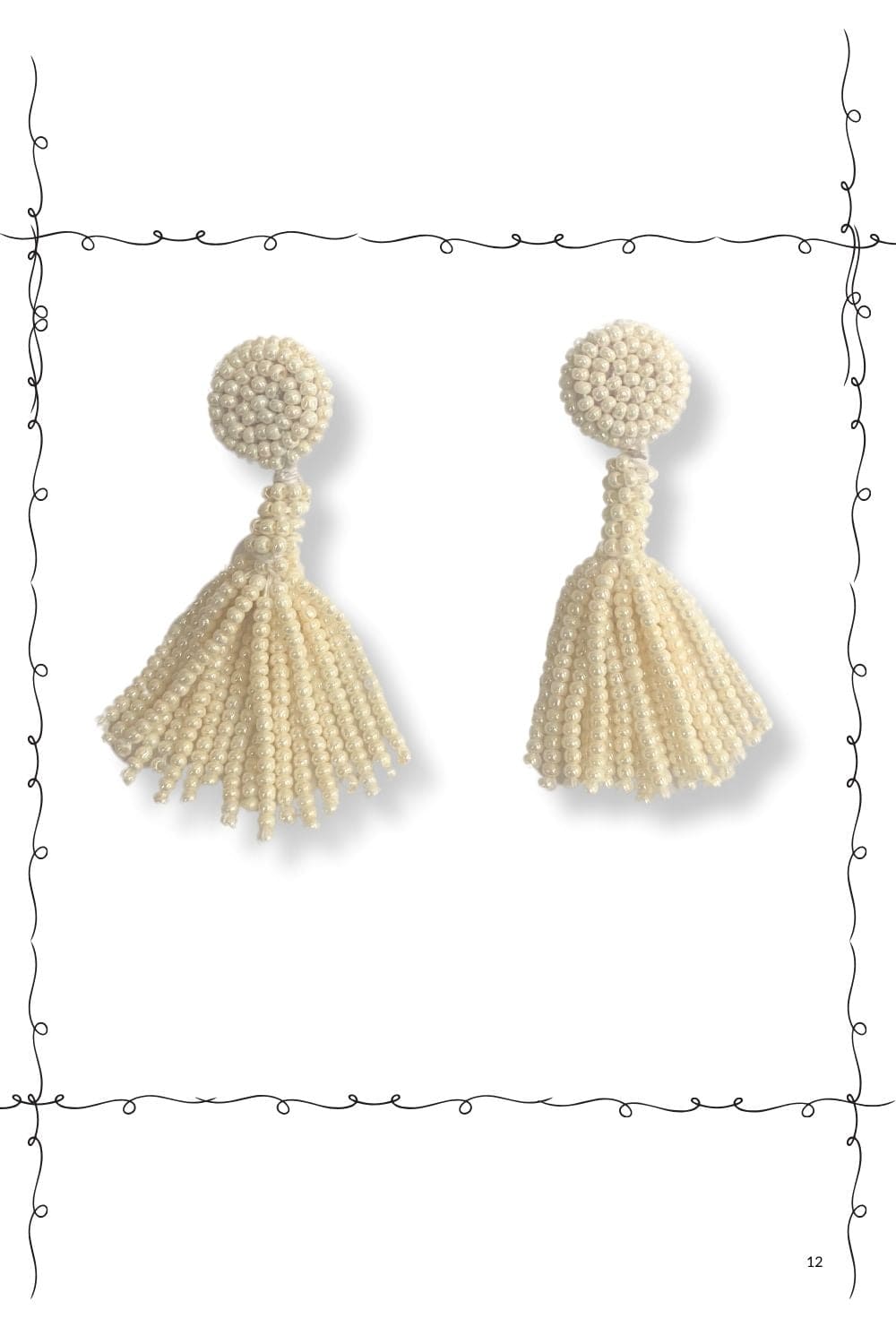 Seed bead off white tassle earrings.