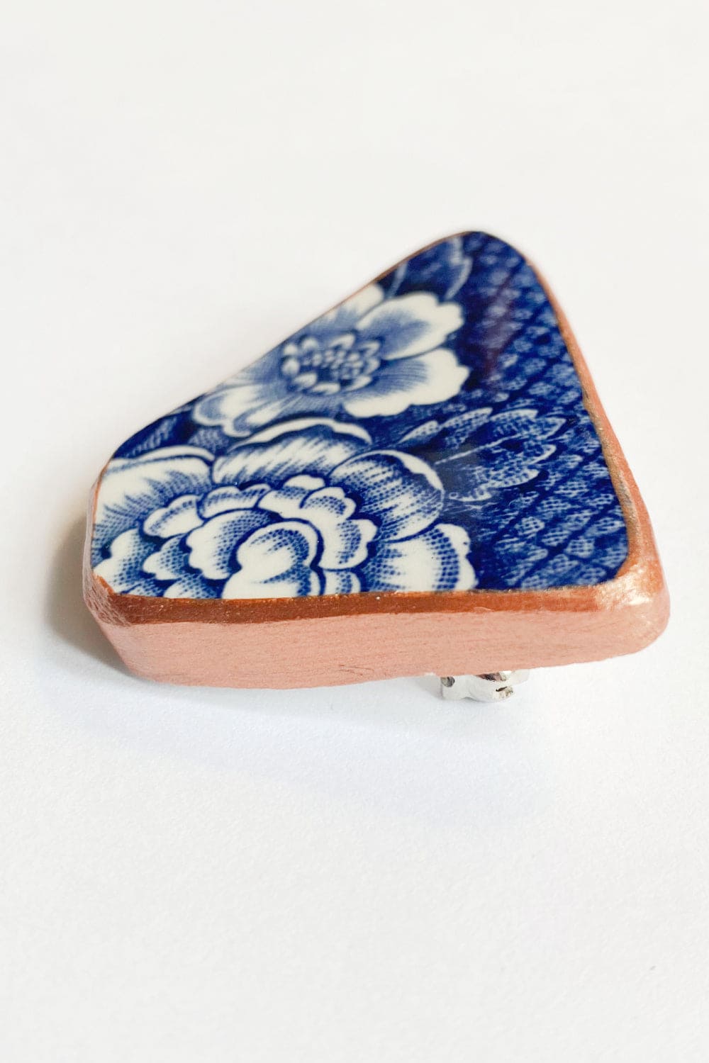 Blue floral recycled china plate pin.