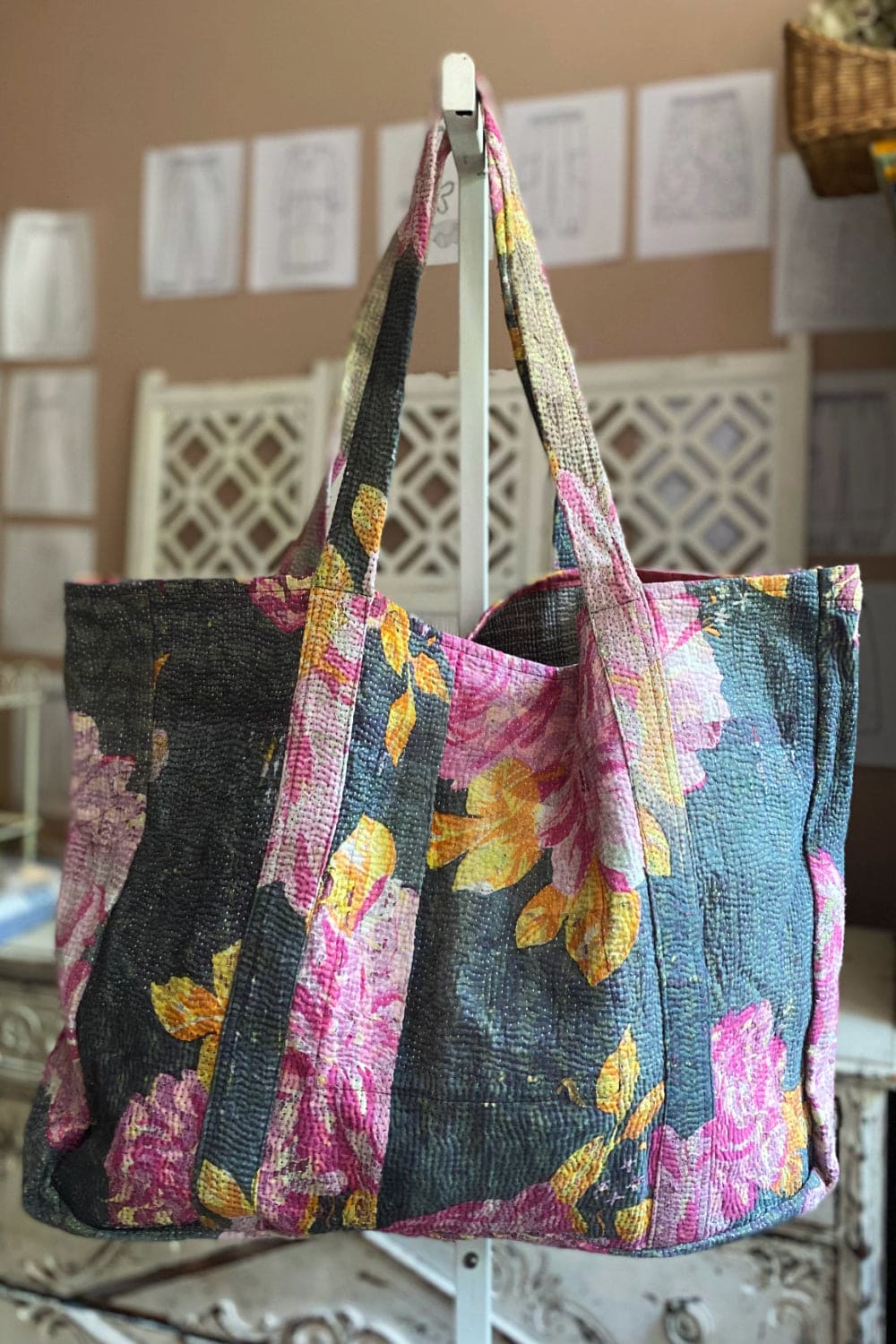 Large kantha tote bag with pink floral design.