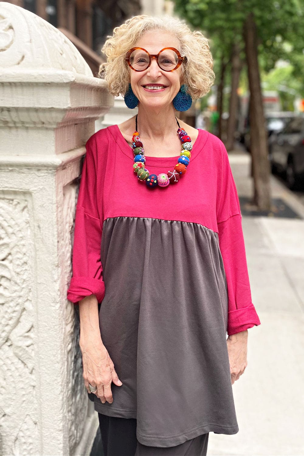 Red Round Neck tunic with colorful felted necklace.