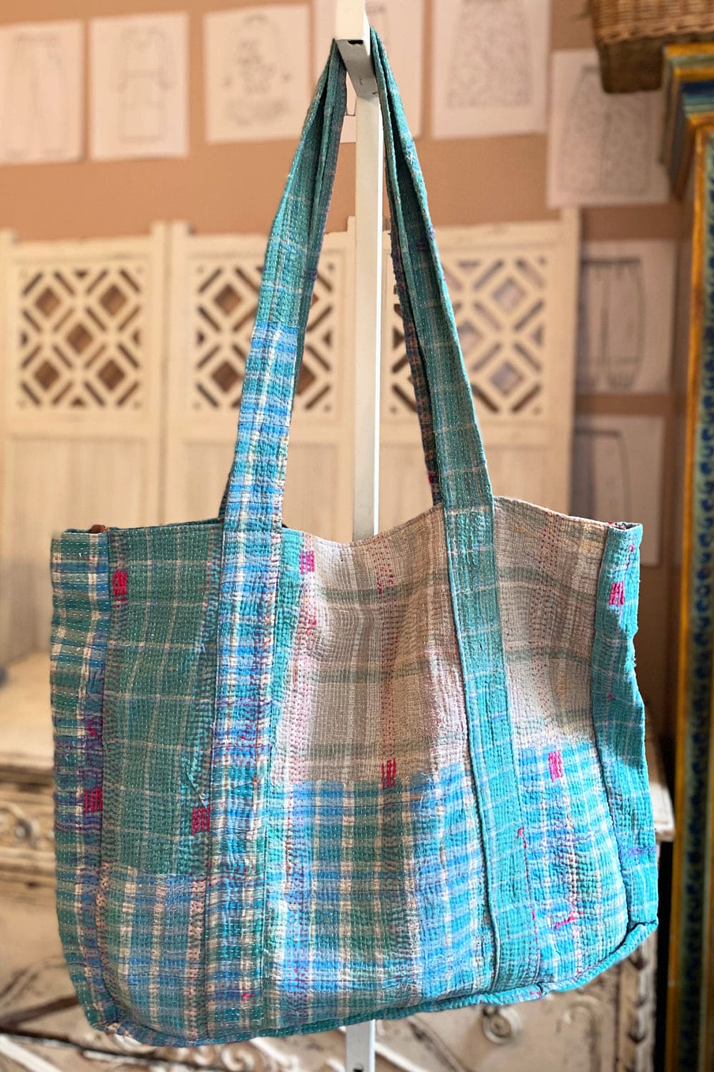 Turquoise with pink accent stitching large overnight tote bag.