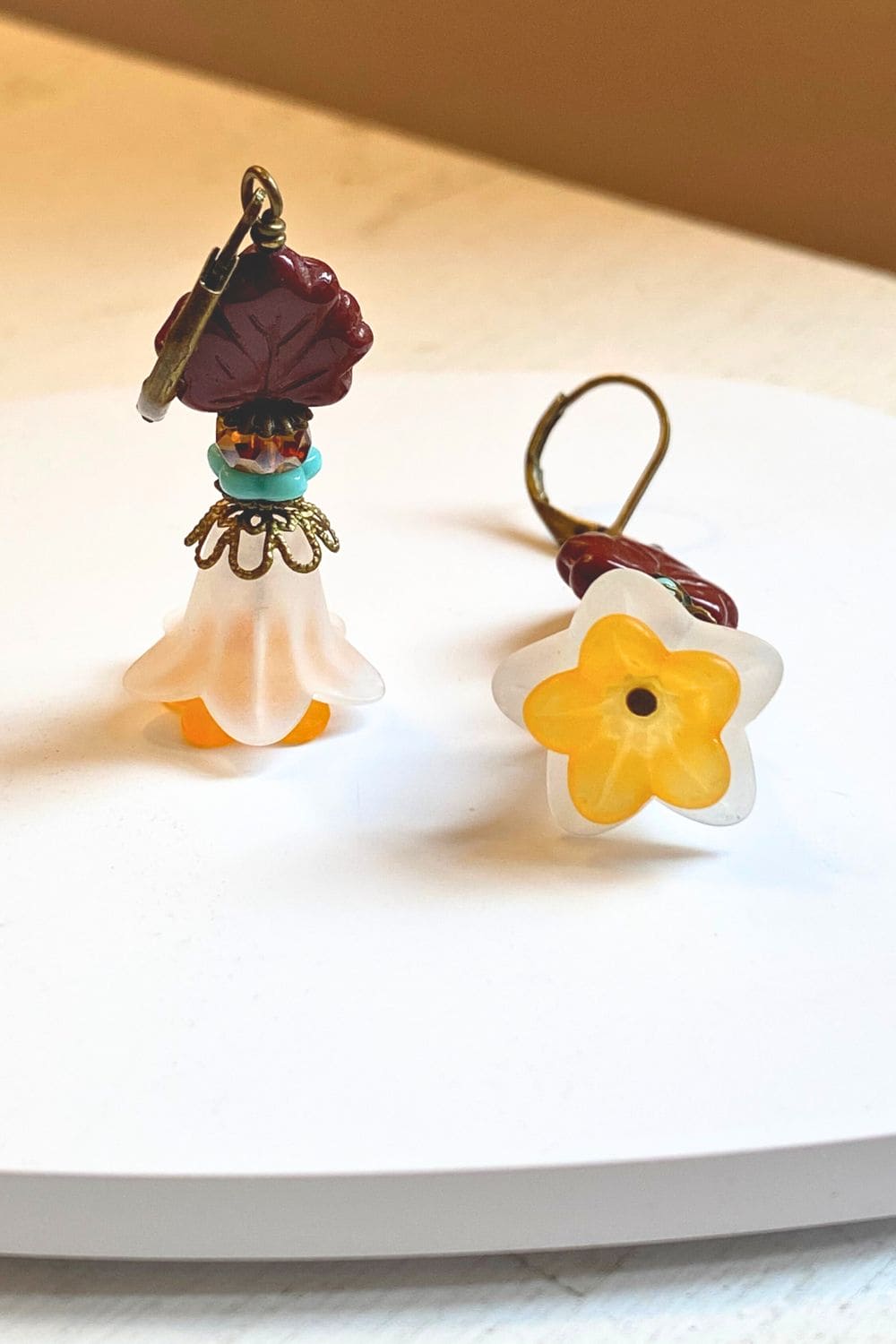 Yellow flower drop earrings.