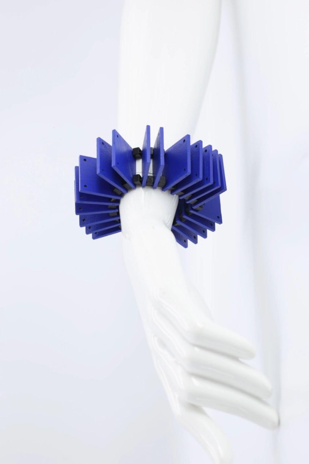 Colbalt blue wooden square bracelet is a geometric designed  peice of costume jewelry.