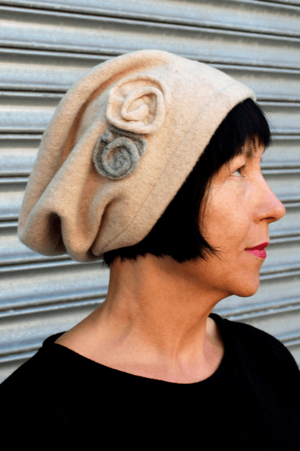 Merino Wool Slouch Hat with two side flowers. Hat is Beige.